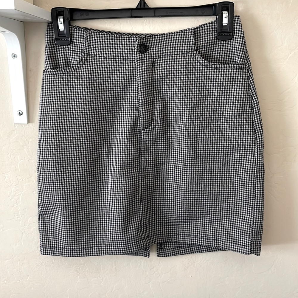 brown, black and creme color mini skirt from brandy melville, never worn!